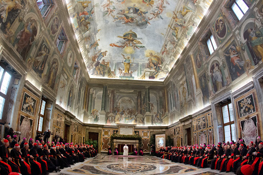 Pope Francis (C) speaks during the audience of the Curia &#8211; it
