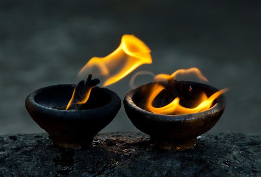sacred fire, coconut oil lamps in a buddhist temple &#8211; it
