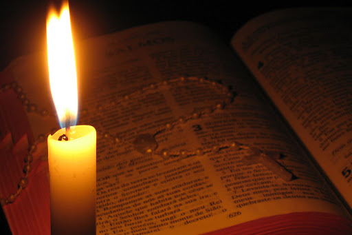 Bible and candle &#8211; it