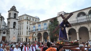 Cuban believers take part in a procession during Good Friday – it
