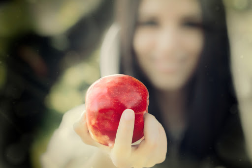 Snow White princess with the famous red apple