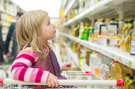 Little girl at the supermarket