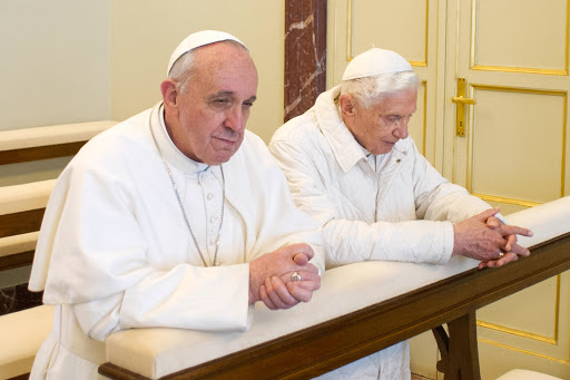 Pope Francis and Pope Benedict praying &#8211; AFP