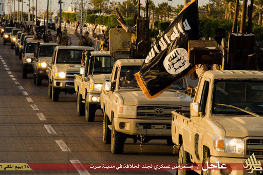 Members of the Islamic State (IS) militant group parading in a street in Libya&#8217;s coastal city of Sirte