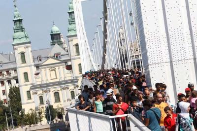 Refugees march across Hungary