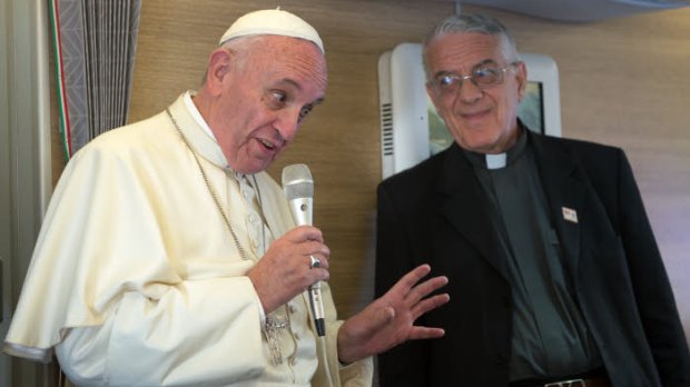 September 22 2015 : Pope Francis talks aboard the papal plane while en route to the United States.