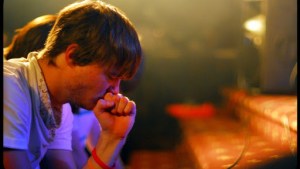 guy pray in a church