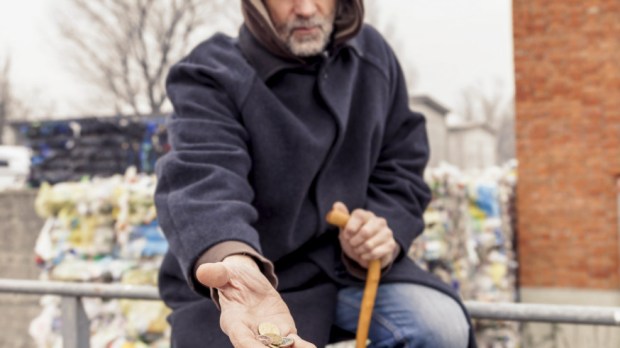 web-beggar-coins-charity-shutterstock_369867158-marino-bocelli-ai