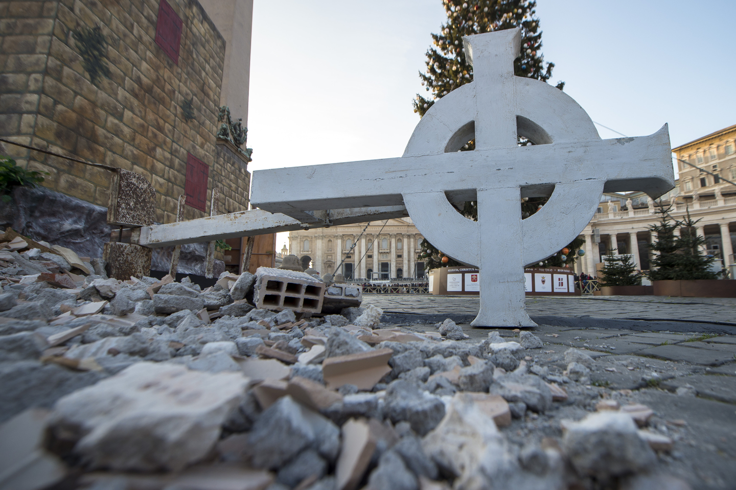 The cross and few debris of the Norcia Saint Benedict Basilica