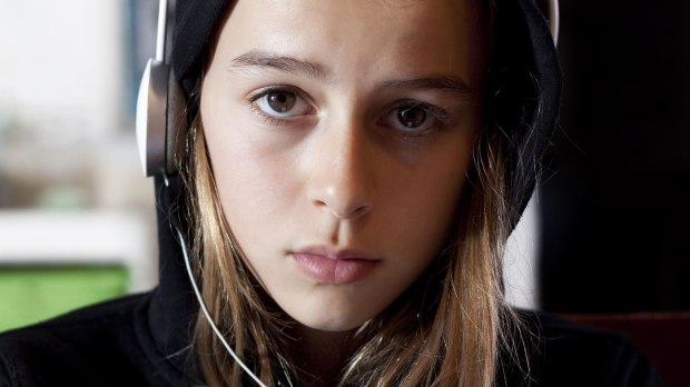 web-serious-headphone-hoodie-girl-teen-annems-shutterstock_127471940