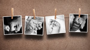 Pictures of parent hand and baby hand hanging on the rope