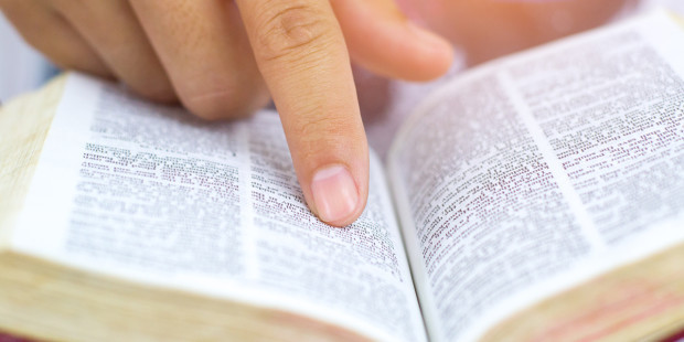 web3-man-hand-finger-bible-book-shutterstock