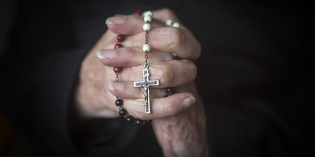 web3-rosary-woman-hands-mary-prayer-shutterstock