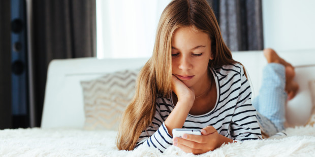 web3-tween-smart-phone-phone-apps-couch-home-teen-tweenager-shutterstock