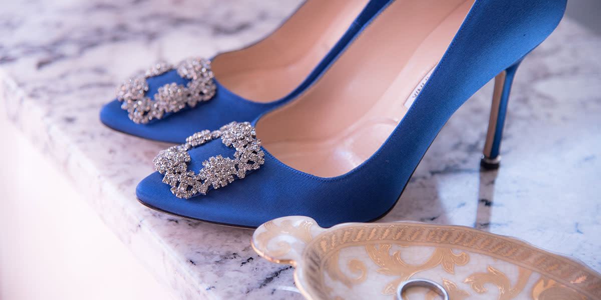 web3-wedding-shoes-blue-rings-bride-shutterstock_719116795-alyssa-vela-ai