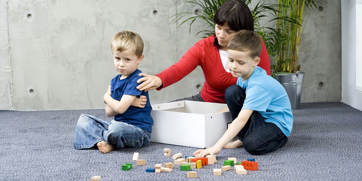 web3-mother-sons-clean-wooden-blocks-living-roomshutterstock_20413681-matka_wariatka-ai