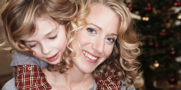 web3-woman-mother-child-daughter-christmas-smile-special-hug-getty-images