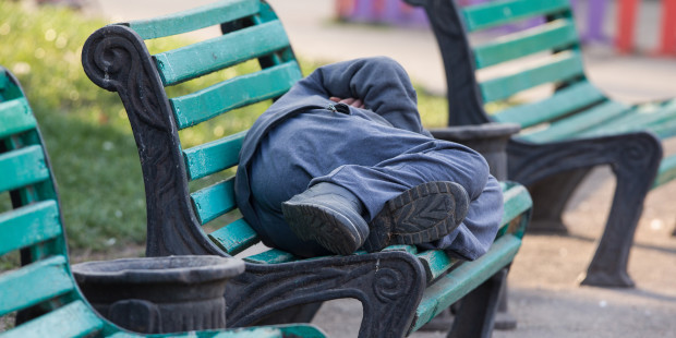 web3-man-sleeping-bench-homeless-de-peyker-shutterstock1
