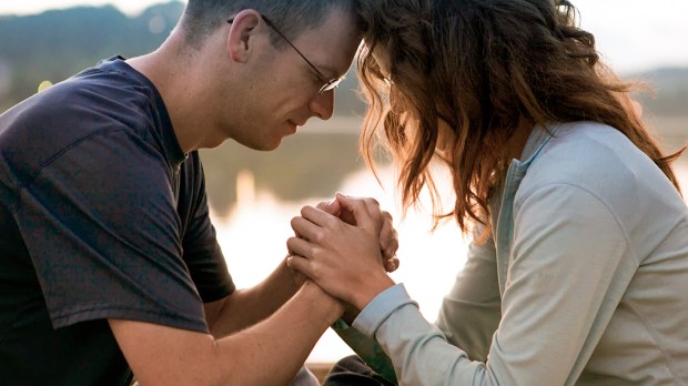COUPLE PRAYING