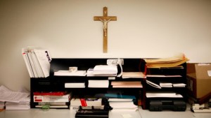 web3-office-work-space-cubicle-work-job-career-desk-crucifix-catholic-marquette-university-cc-by-nc-nd-2-0