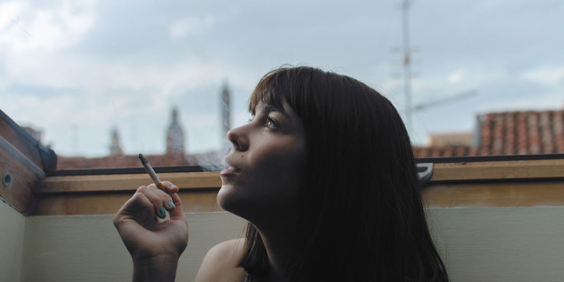 web3-woman-smoking-roof-outside-alone-riccardo-fissore-unsplash