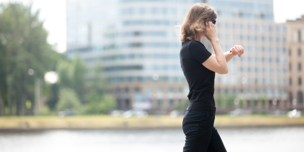 web3-woman-walk-walking-power-walk-exercise-health-wellness-office-break-phone-watch-shutterstock