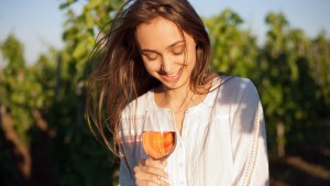 GIRL DRINKING WINE