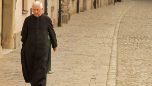 PRIEST WALKING
