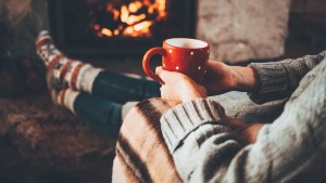 WOMAN,RELAXING,FIREPLACE