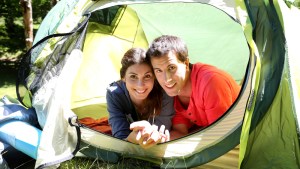 COUPLE IN CAMP TENT