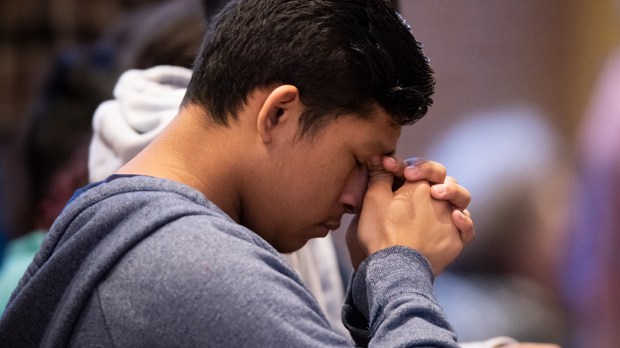 PRAYING,PRAYER,YOUNG MAN