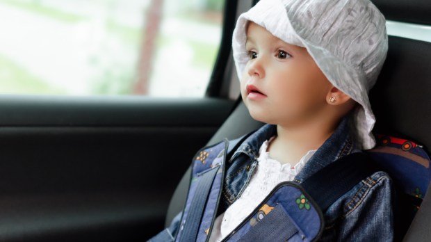 web2-little-child-fasten-seat-belt-in-high-back-booster-car-seat.-child-safety.-shutterstock_1048388275.jpg