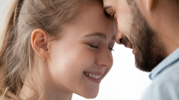 WEB2 -Close up of loving man and woman touching forehead having sweet tender moment together, happy millennial couple smile caressing each other, young husband and wife enjoy tenderness at home – shutterstock_1230899386.jpg