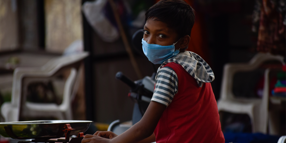INDIAN BOY WITH MEDICAL MASK,