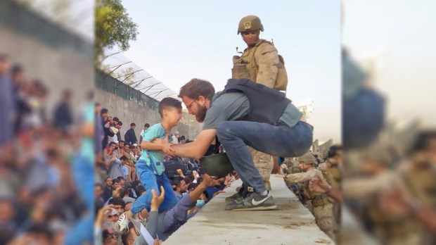 Italian-consul-in-Kabul-Tommaso-Claudi-rescues-a-child.jpg