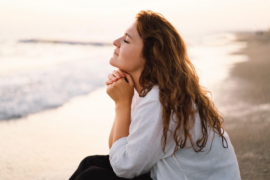 woman-pray-shutterstock_2086891912.jpg