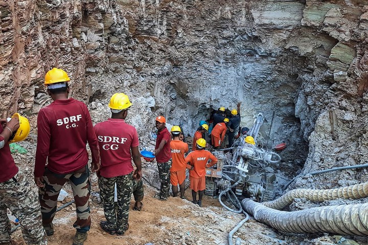 Indian emergency workers were scrambling June 14 to rescue a 10-year-old boy - Rahul Sahu-AFP