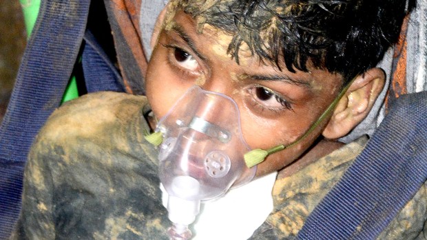 Indian emergency workers were scrambling June 14 to rescue a 10-year-old boy - Rahul Sahu-AFP
