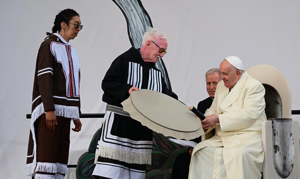 Pope-Francis-meets-Inuit-drum-dancers-at-Nakasuk-Elementary-School-Square-in-Iqaluit-AFP