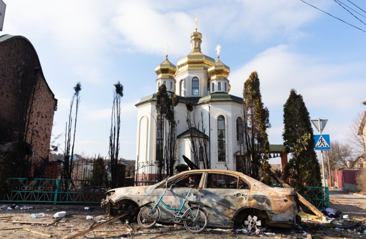 A damaged Irpin church still stands amidst the rubble of war torn Ukraine