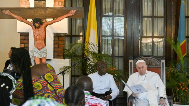 Pope-Francis-back-blesses-attendees-as-he-meets-with-victims-of-the-conflict-in-eastern-Democratic-Republic-of-Congo-AFP